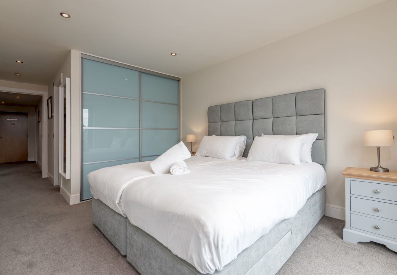 Master bedroom with ensuite shower room and views over the bowling green