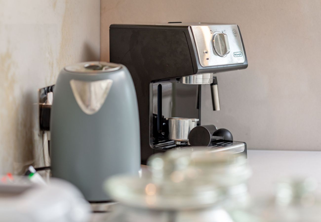 Coffee station with espresso machine and kettle in fully equipped self-catering kitchen, 42 Lade Braes, St Andrews.